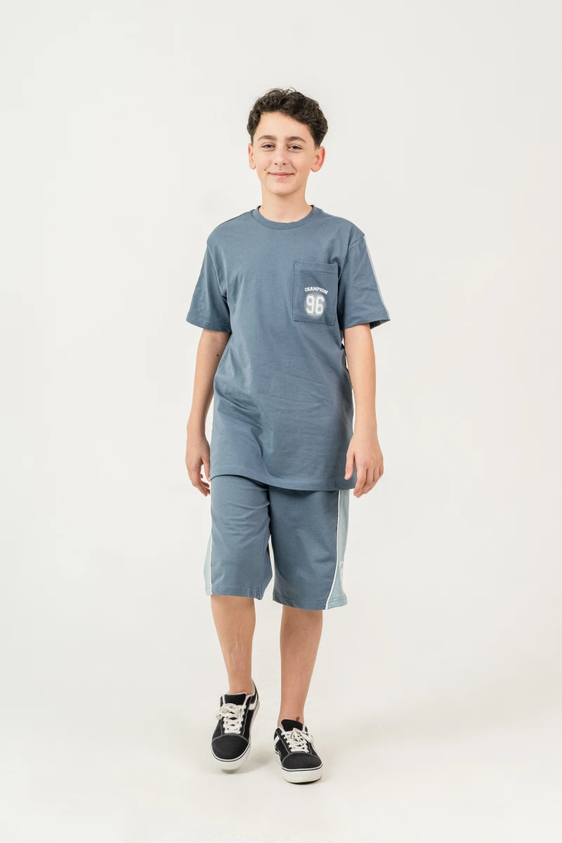 CHAMPION 96 BASKILI ERKEK ÇOCUK KAPRİLİ TAKIM 8470