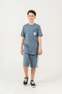 CHAMPION 96 BASKILI ERKEK ÇOCUK KAPRİLİ TAKIM 8470